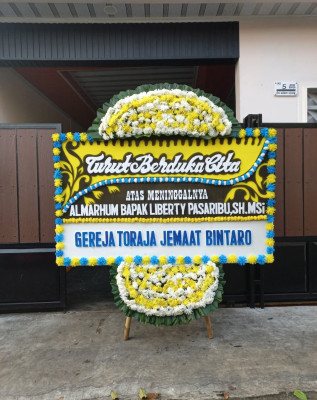 Papan Bunga Duka di Sutojayan